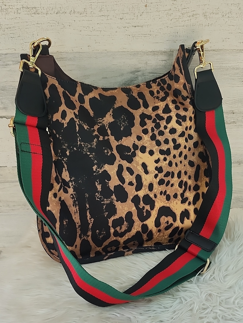 AH-DORNED LEOPARD PRINT CROSSBODY BAG FROM ANTHROPOLOGIE